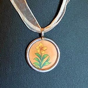 Boutique | Sterling Silver Still Life Flower Pendant on Fabric Necklace.